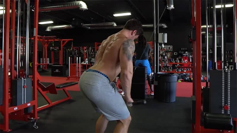 Troy performing a cable pull over with correct form