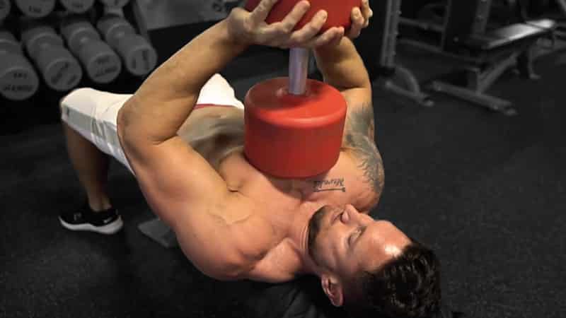 Troy doing a dumbbell pressout