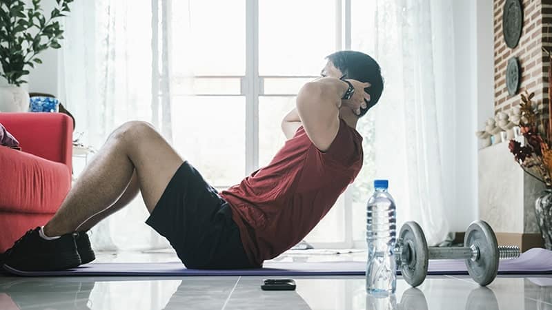 man doing metabolic training at home